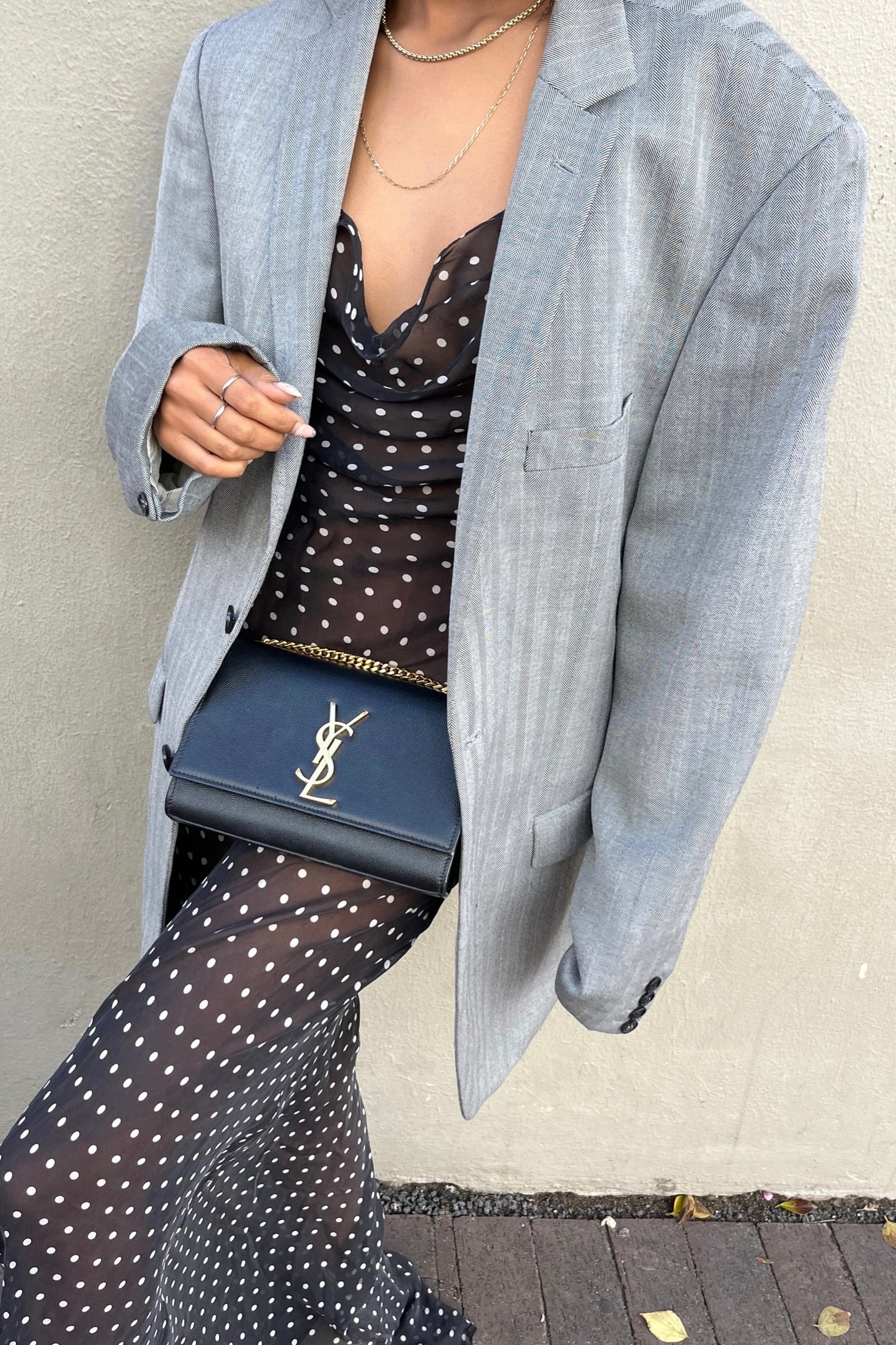 the grey blazer
