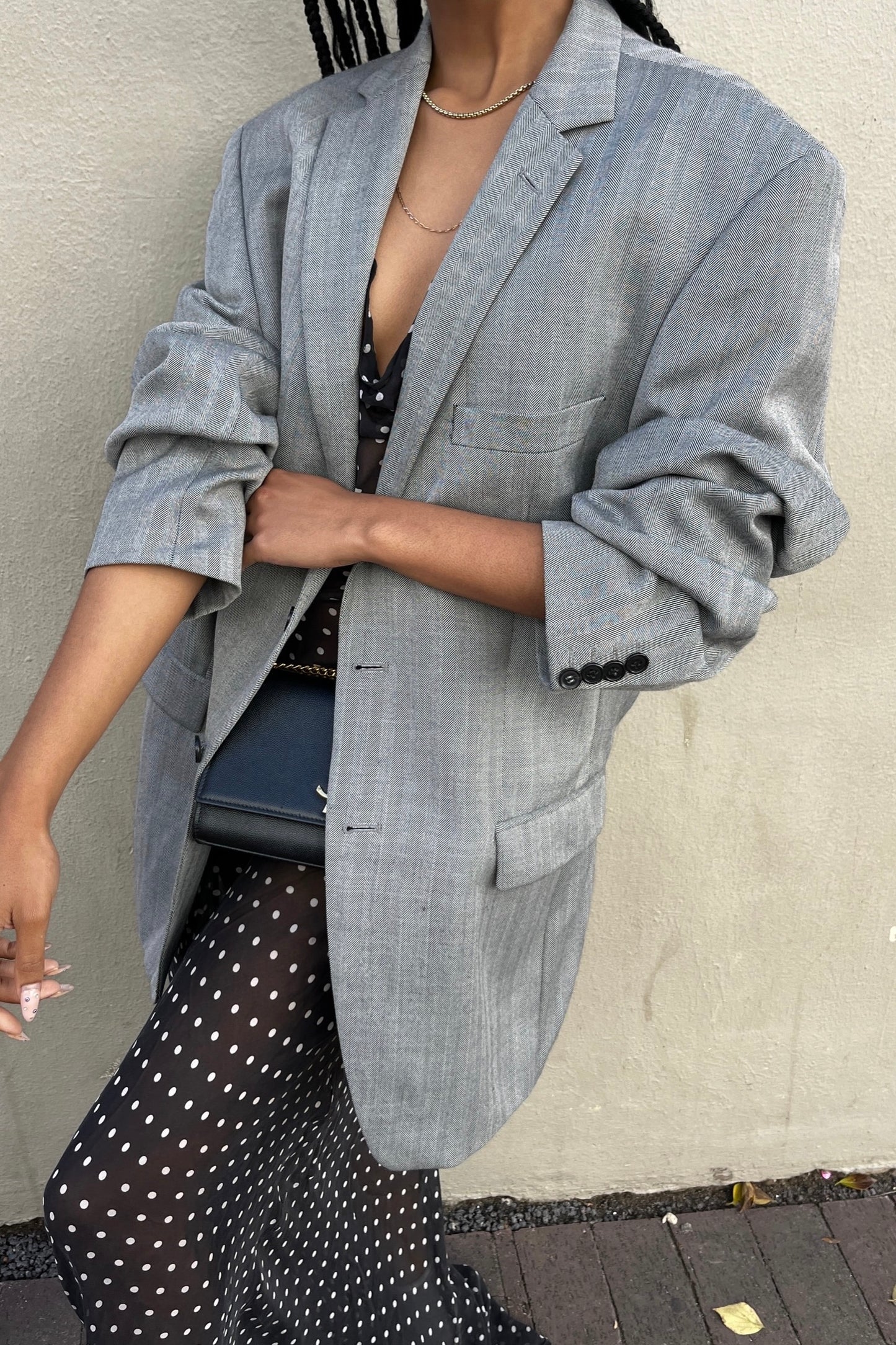 the grey blazer