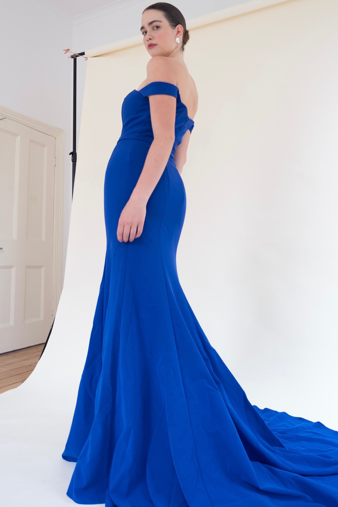 Scarlett Fashion Morigan gown in cobalt blue with off-the-shoulder sleeves and lace bodice, pre-loved and available for resale as elegant sustainable occasionwear.