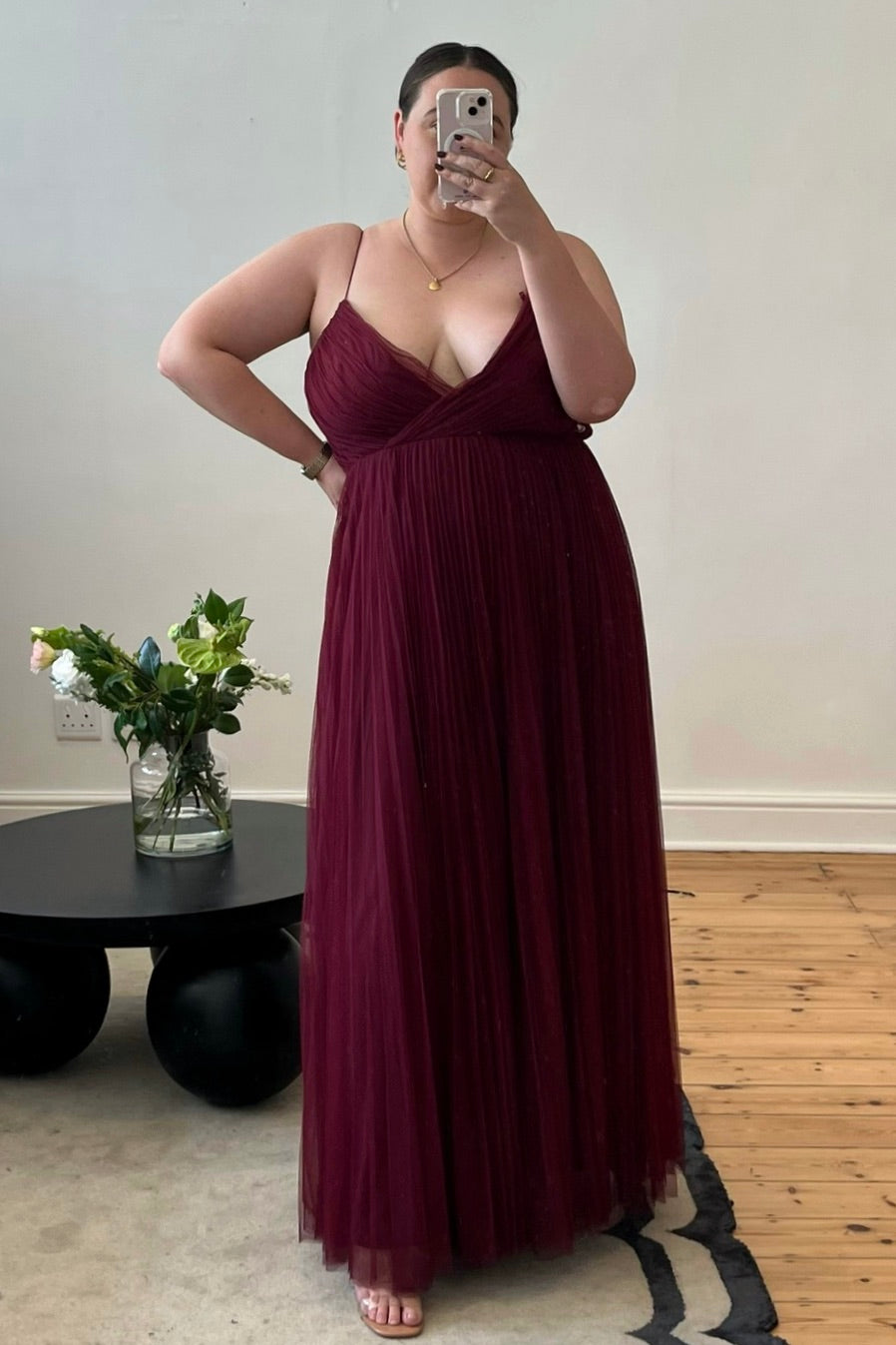 Burgundy tulle fit-and-flare gown with pleated skirt and keyhole back, pre-loved and available for resale as elegant sustainable occasionwear.