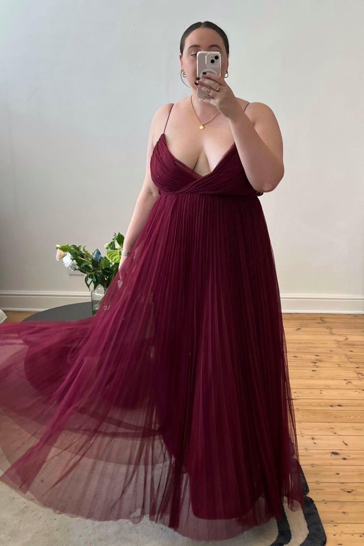 Burgundy tulle fit-and-flare gown with pleated skirt and keyhole back, pre-loved and available for resale as elegant sustainable occasionwear.