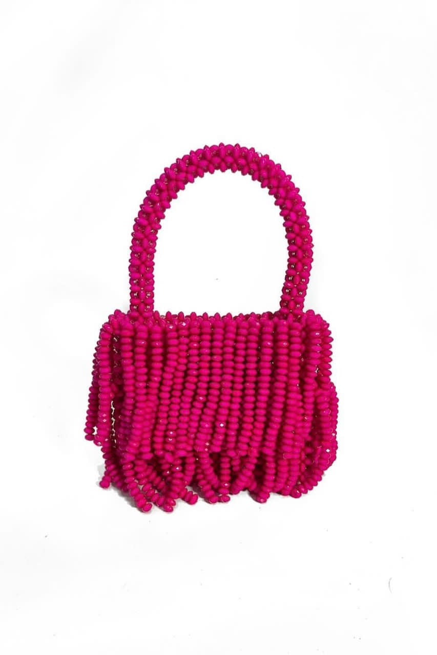 Bright pink mini beaded fringe bag, hand-held and handmade in Africa