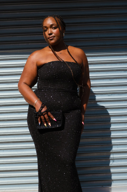 Oh Polly The Bader Gown in black, a boobtube fitted embellished mesh gown. Elegant, empowering, and available now for rental.