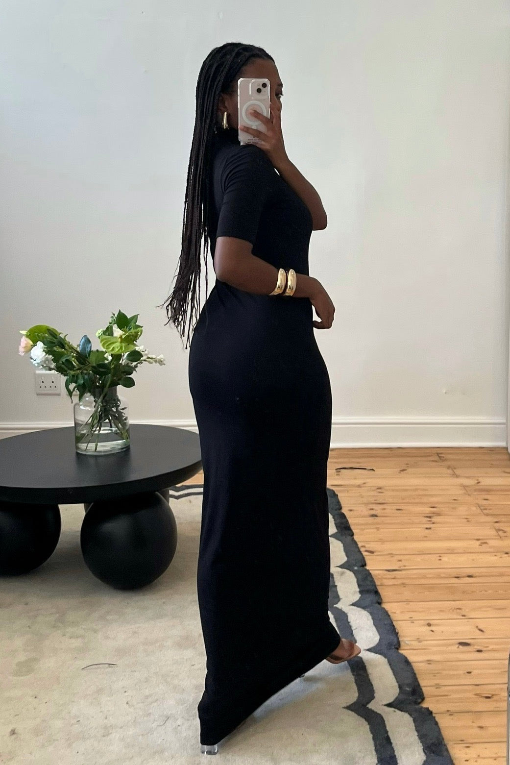 Black turtleneck maxi dress by Viveh with short sleeves and fitted silhouette, pre-loved and available for resale as elegant sustainable occasionwear.