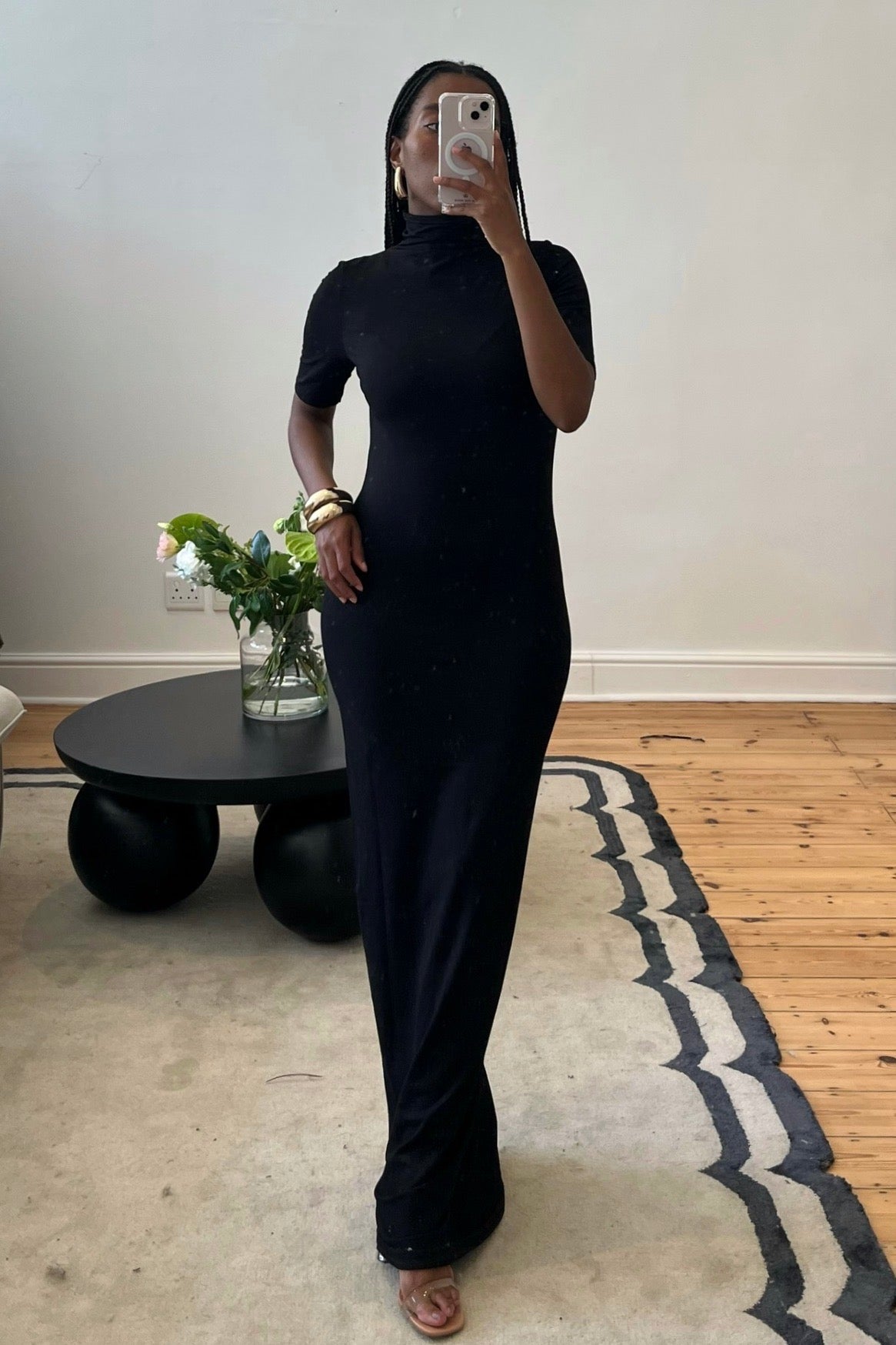 Black turtleneck maxi dress by Viveh with short sleeves and fitted silhouette, pre-loved and available for resale as elegant sustainable occasionwear.