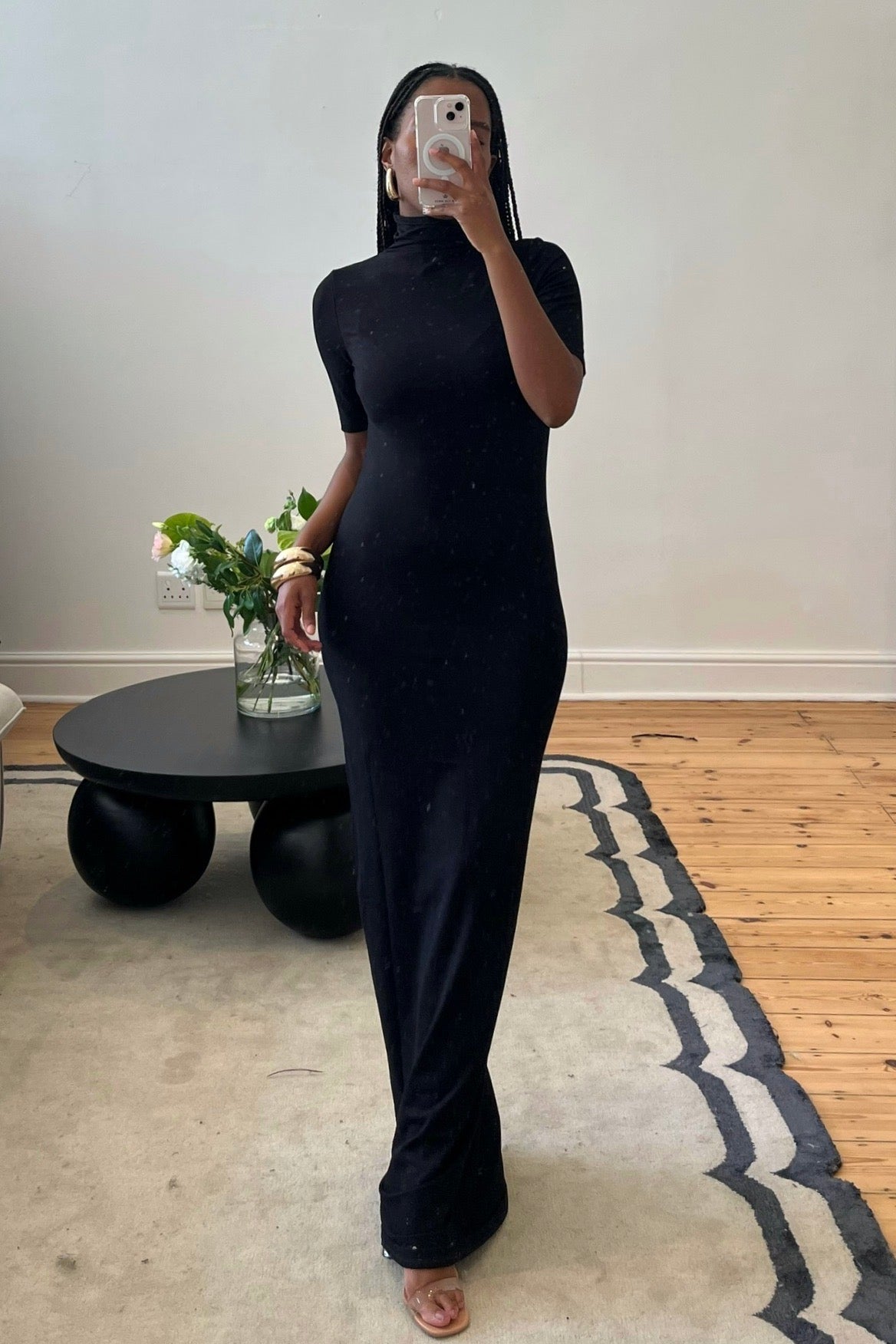 Black turtleneck maxi dress by Viveh with short sleeves and fitted silhouette, pre-loved and available for resale as elegant sustainable occasionwear.