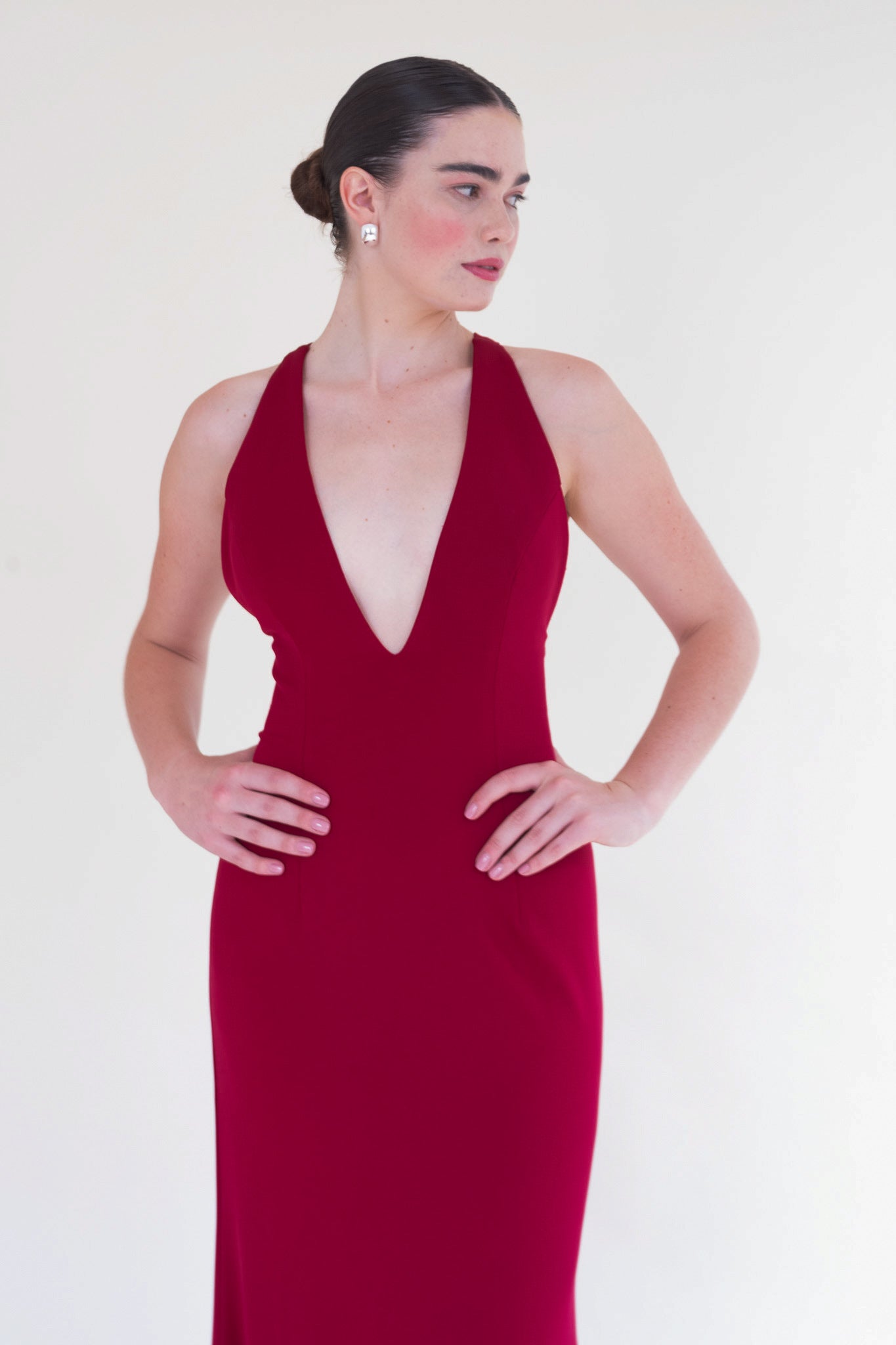 Scarlett Fashion Amren gown with deep V-neckline and mermaid silhouette, pre-loved and available for resale as elegant sustainable occasionwear.