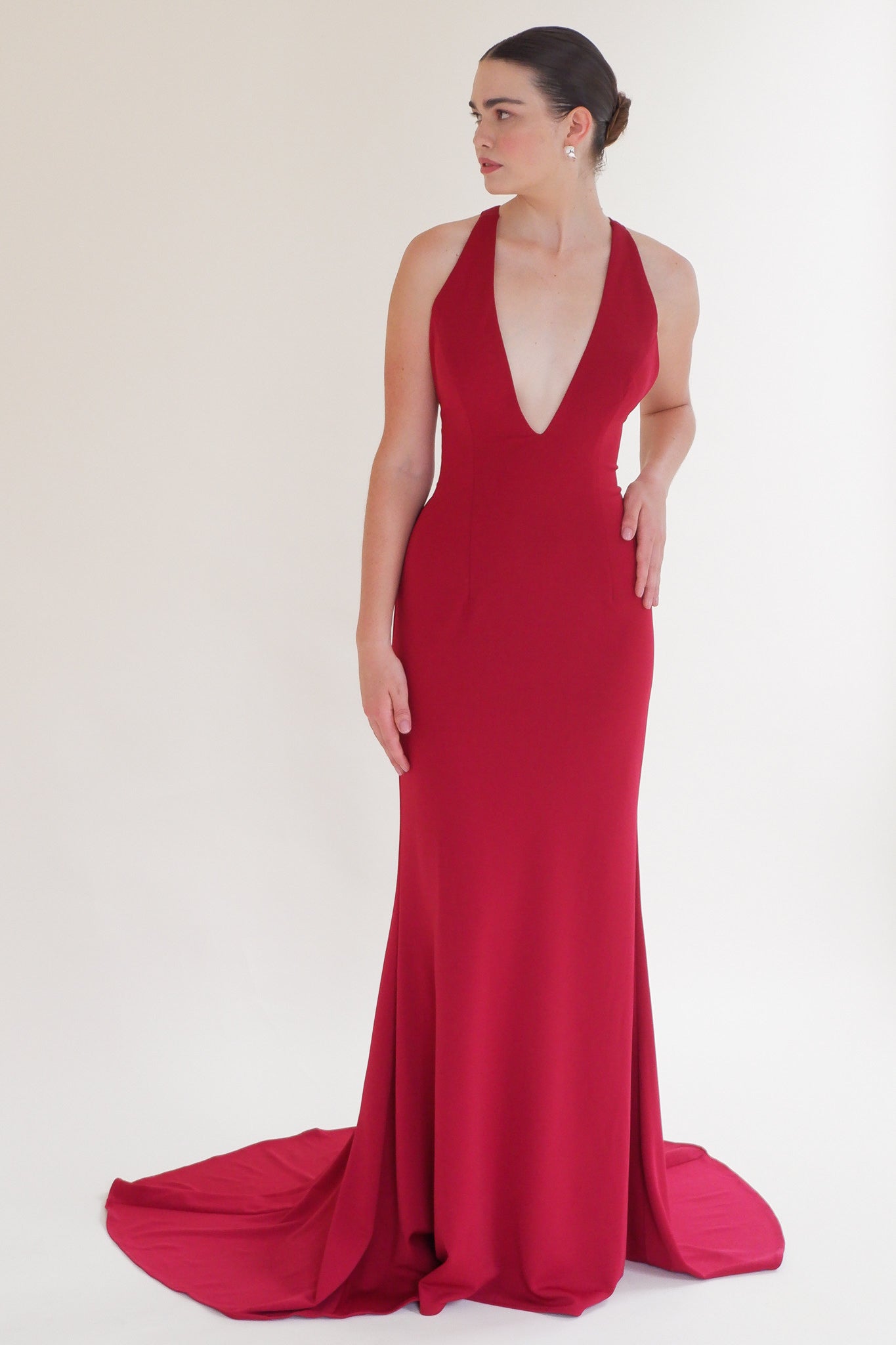 Scarlett Fashion Amren gown with deep V-neckline and mermaid silhouette, pre-loved and available for resale as elegant sustainable occasionwear.