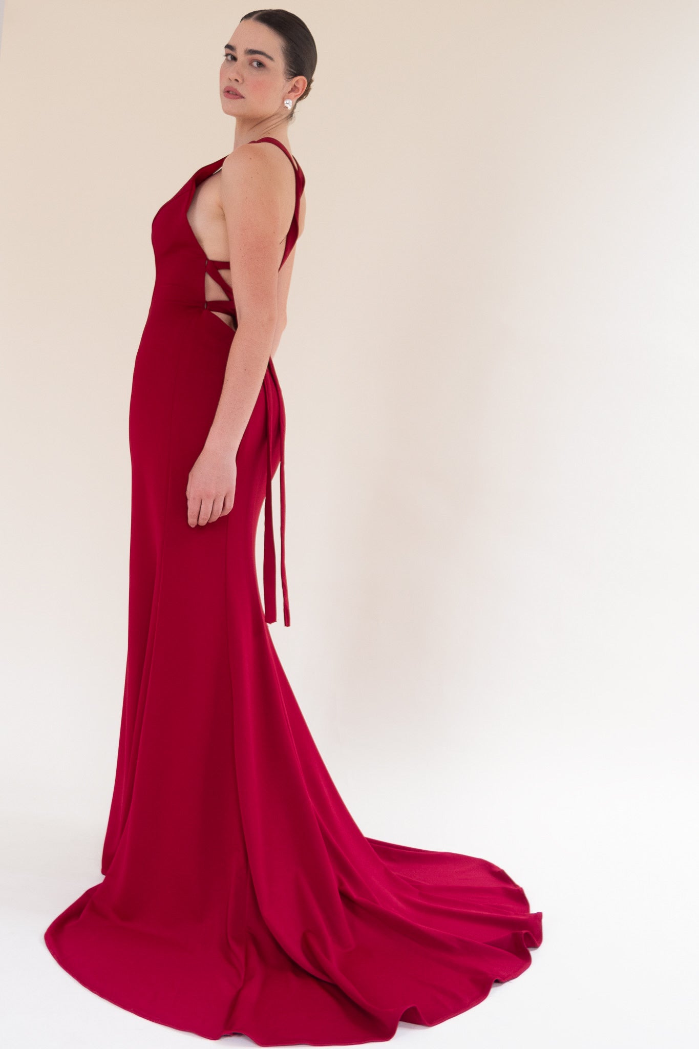 Scarlett Fashion Amren gown with deep V-neckline and mermaid silhouette, pre-loved and available for resale as elegant sustainable occasionwear.