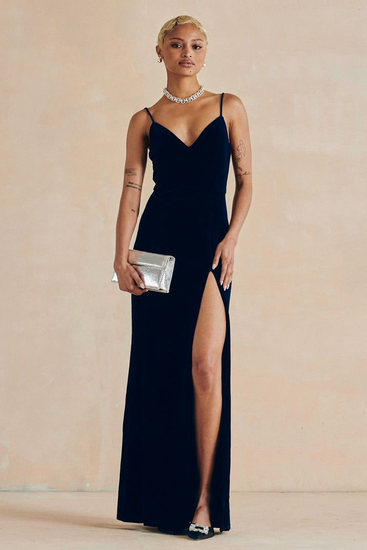 Side profile showing puff sleeves and fitted waist