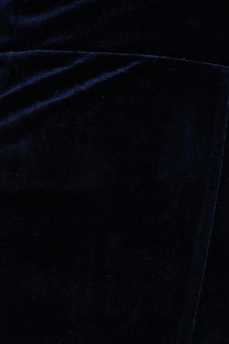 Close up view of the fabric of the navy velvet fabric