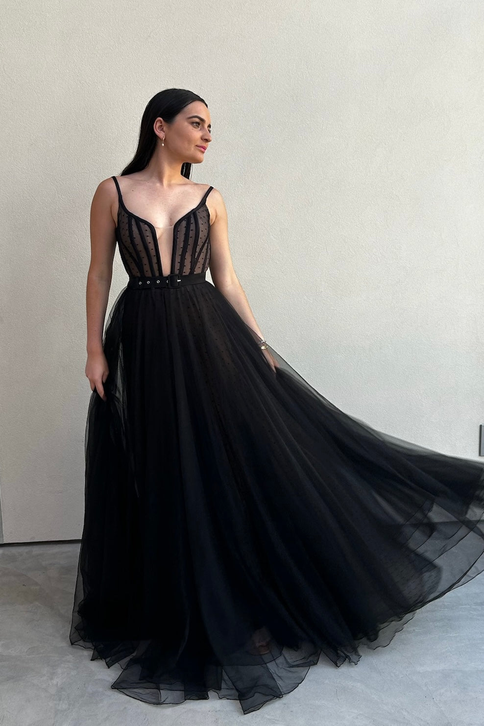 The Lucea Gown by Stephen Van Eeden – a dramatic black one-shoulder tulle gown perfect for formal occasions. Elegant, timeless, and available now.