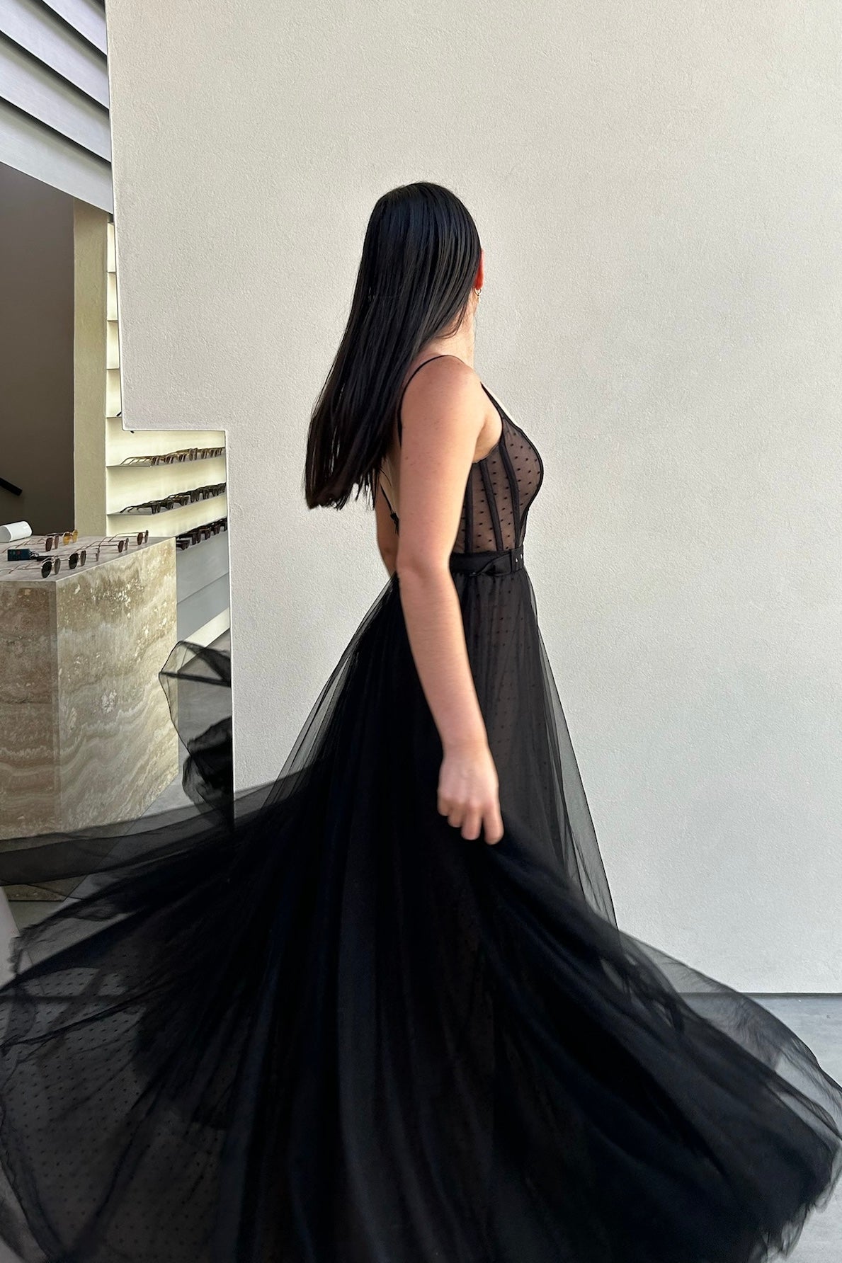 The Lucea Gown by Stephen Van Eeden – a dramatic black one-shoulder tulle gown perfect for formal occasions. Elegant, timeless, and available now.
