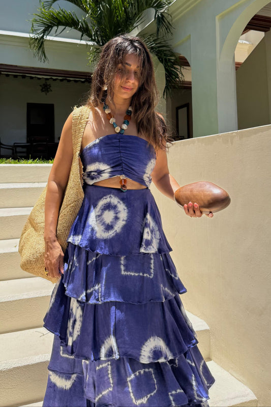 The Ire Dress by KÍLẸ̀ŃTÀR in blue embroidered, available to hire at Style Rotate