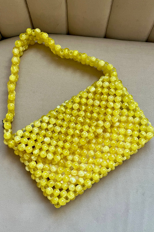 yellow beaded bag