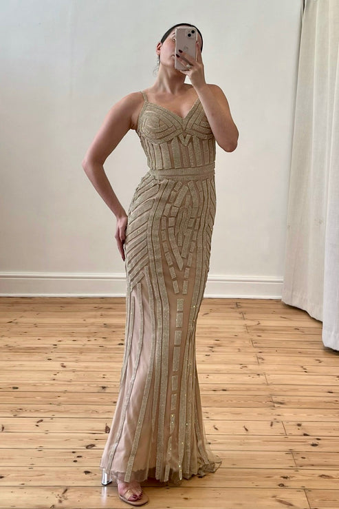 Elegant gold embellished gown featured in Style Rotate’s resale fashion South Africa edit for winter events