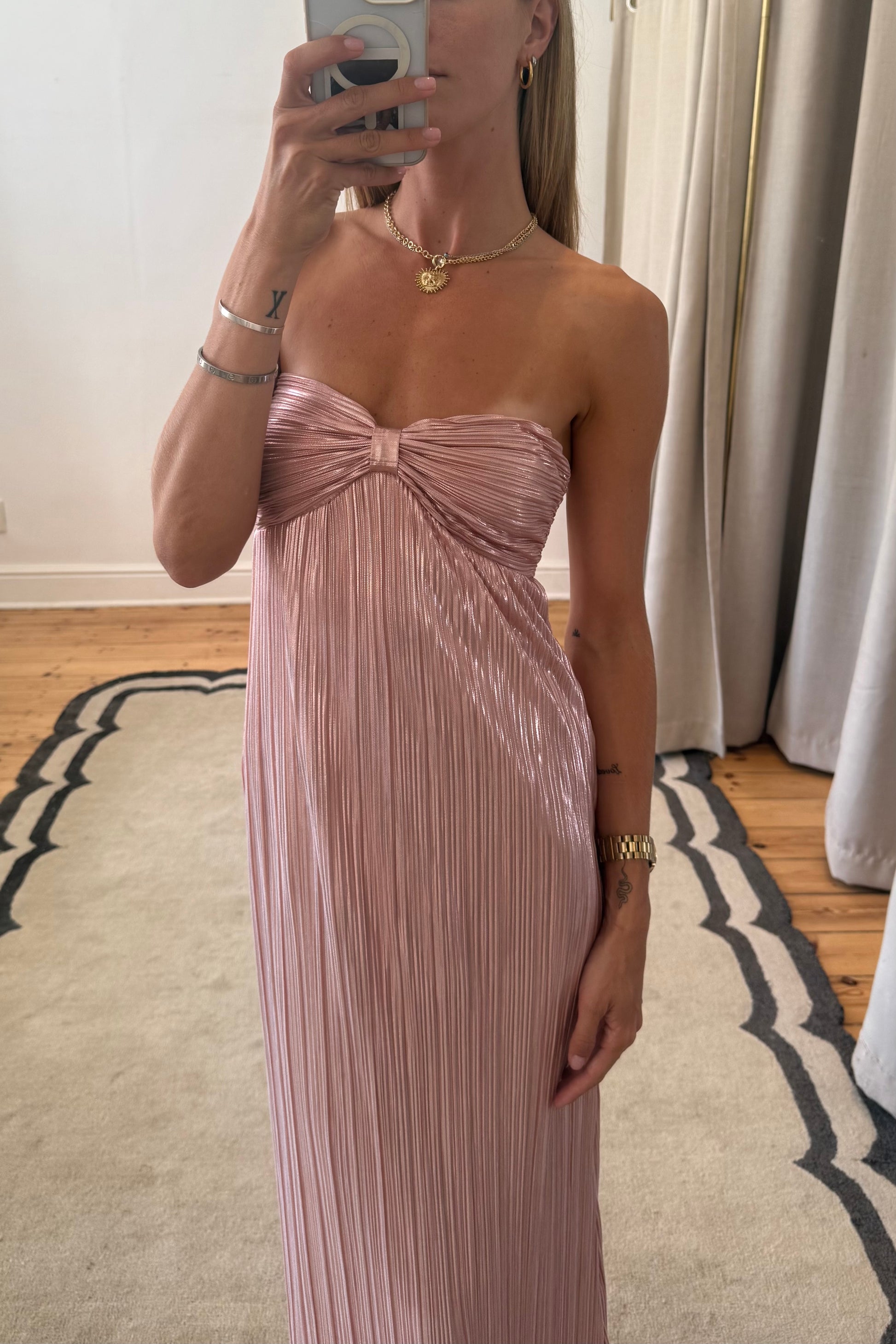 ladies pink dress angled pose showing flow and shape