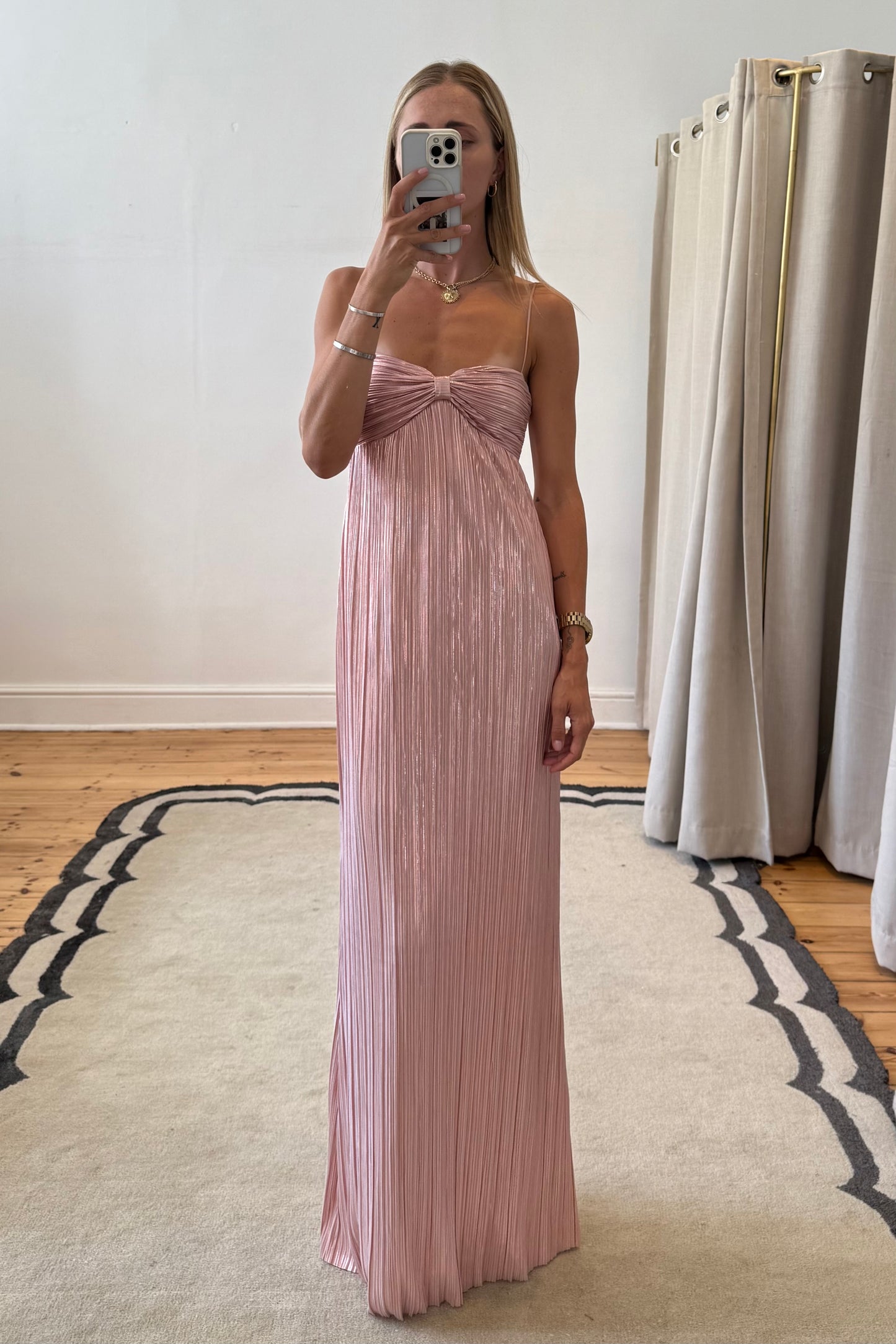ladies pink dress mirror selfie with fitted bodice detail