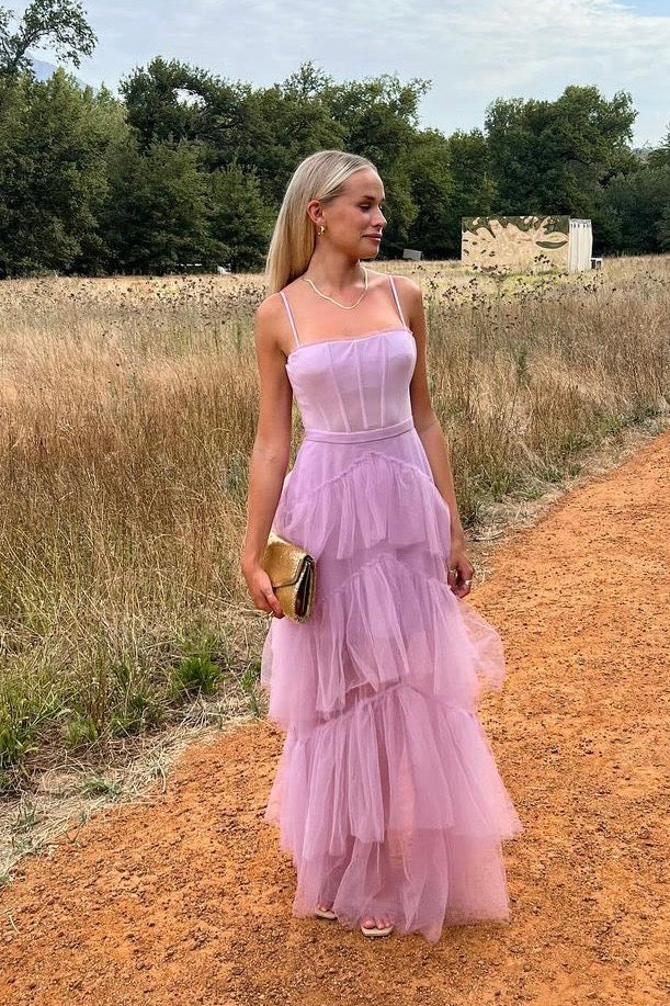The Josie Gown by Custom Design – a romantic lilac tulle gown with a structured corset bodice and ruffled skirt. Elegant, whimsical, and available now for dress hire.