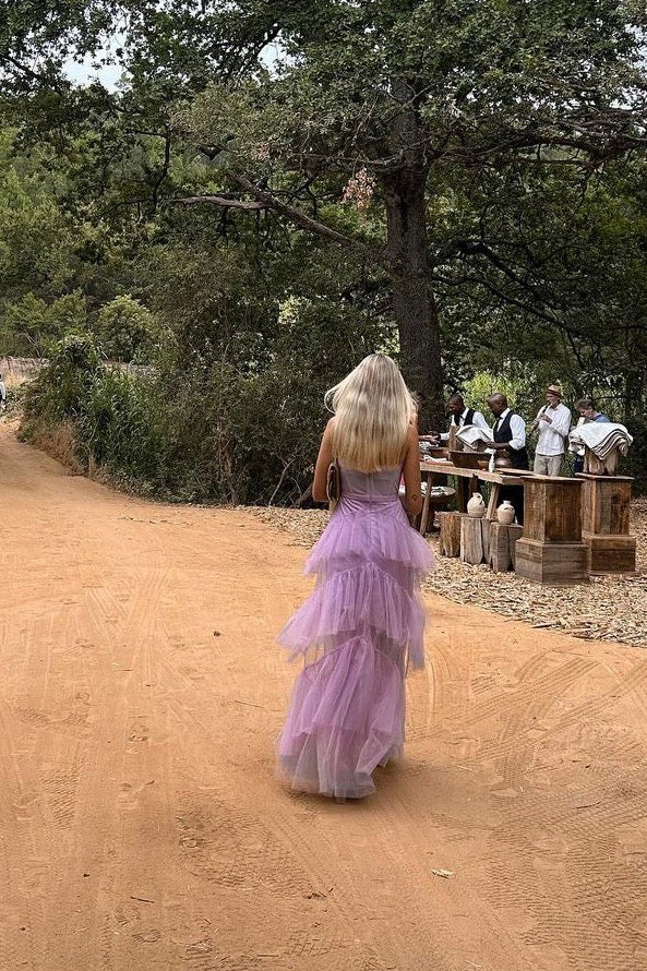 The Josie Gown by Custom Design – a romantic lilac tulle gown with a structured corset bodice and ruffled skirt. Elegant, whimsical, and available now for dress hire.