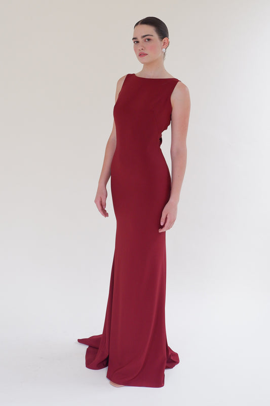 Deep red Scarlett Fashion floor-length gown with high neck and back cut-out, pre-loved and available for resale as elegant sustainable occasionwear.