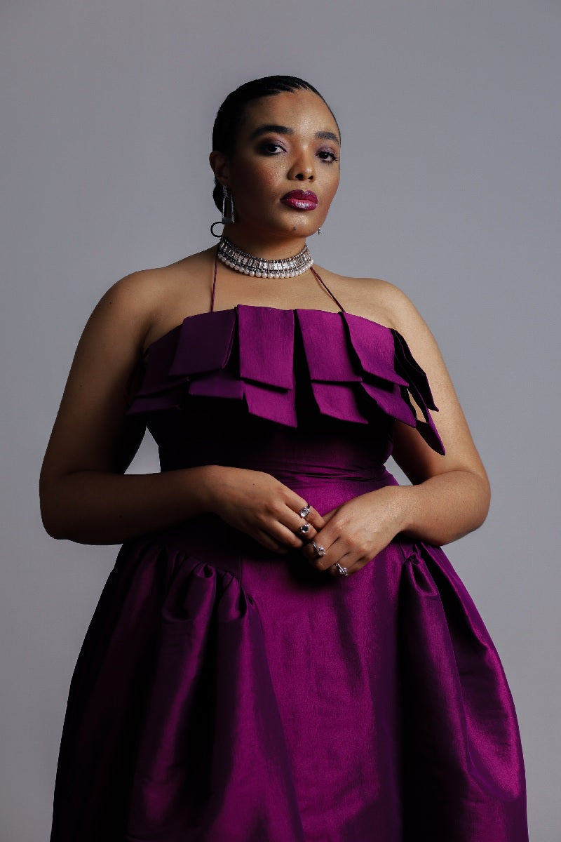  The Makarios Dress by Desirée Iyama in purple — bold and fashion-forward dress for hire, perfect for standout special occasions.