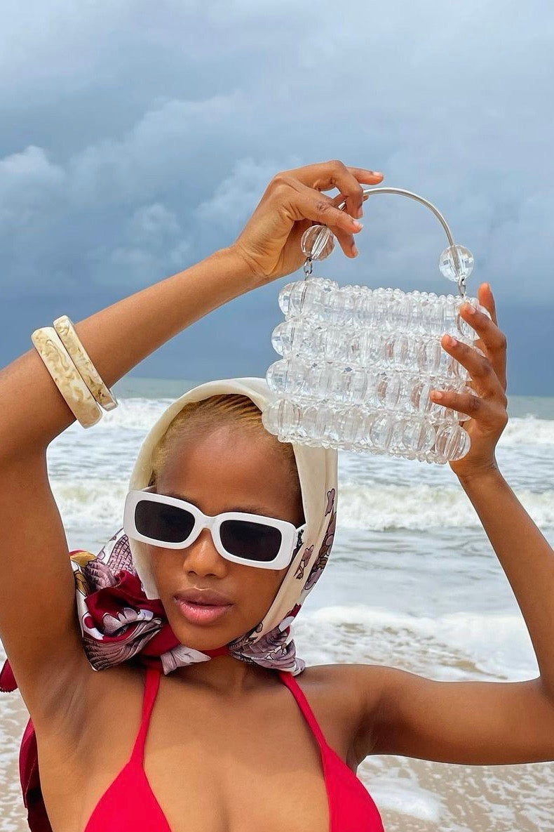 Crystal-clear mini white beaded handbag with African craftsmanship

