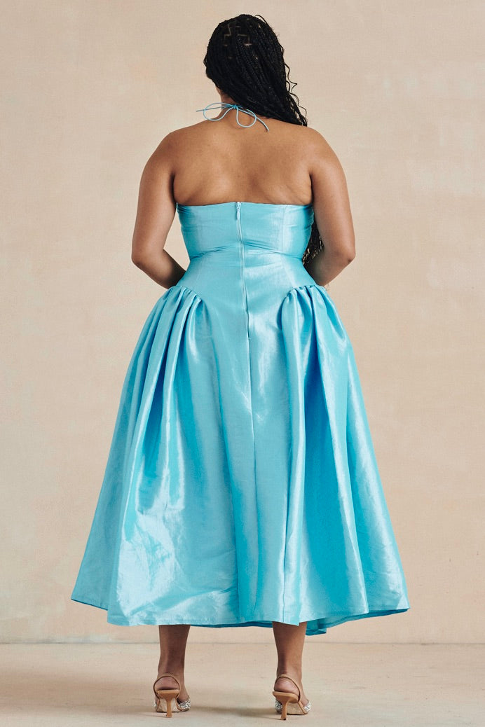 The Meraki Dress by Desirée Iyama in turquoise — eye-catching and playful designer resalel for parties and high-impact occasions.
