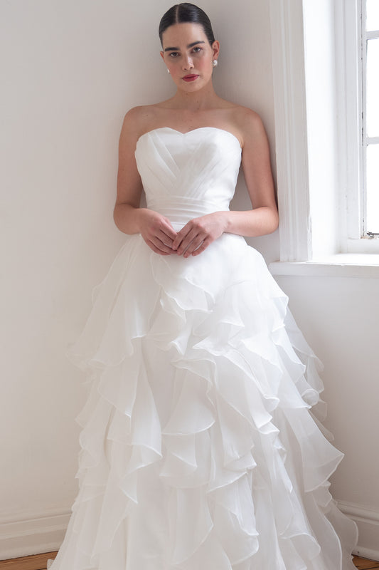 Scarlett Fashion Rhys gown with organza ruffles and fit-and-flare silhouette, pre-loved and available for resale as elegant sustainable occasionwear.
